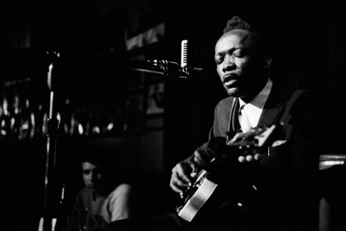 Jim Marshall: John Lee Hooker performing at a NYC nightclub 1962